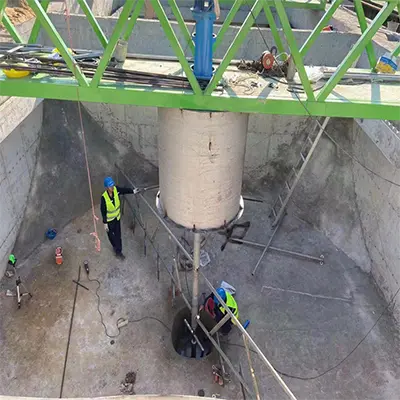 Central transmission vertical frame scraper